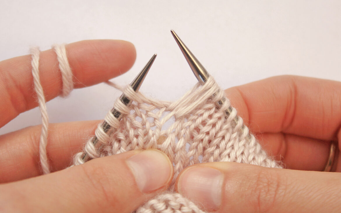 Creating the second loop of textured stitch pattern